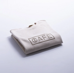 The Café Logo Embroidery Sweater in Ecru Melange