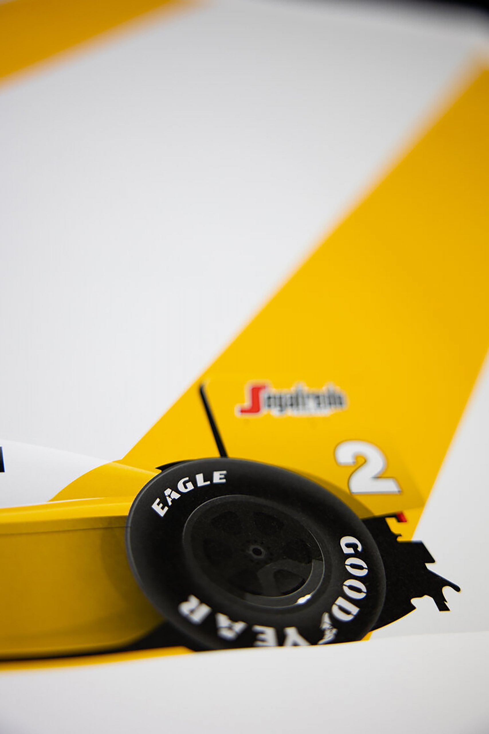 Keke Rosberg, White And Yellow McLaren MP4/2C Tag Porsche, 1986 Portuguese Grand Prix